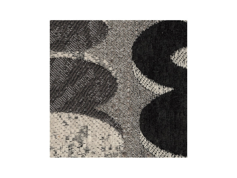 Textured fabric with black, gray, and white pattern on a white background