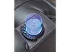 Blue glowing cup holder coaster on a car cup holder