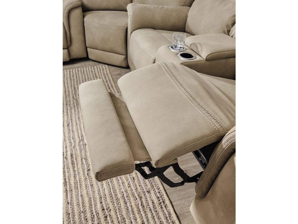 Beige recliner sofa with cup holder on a textured rug